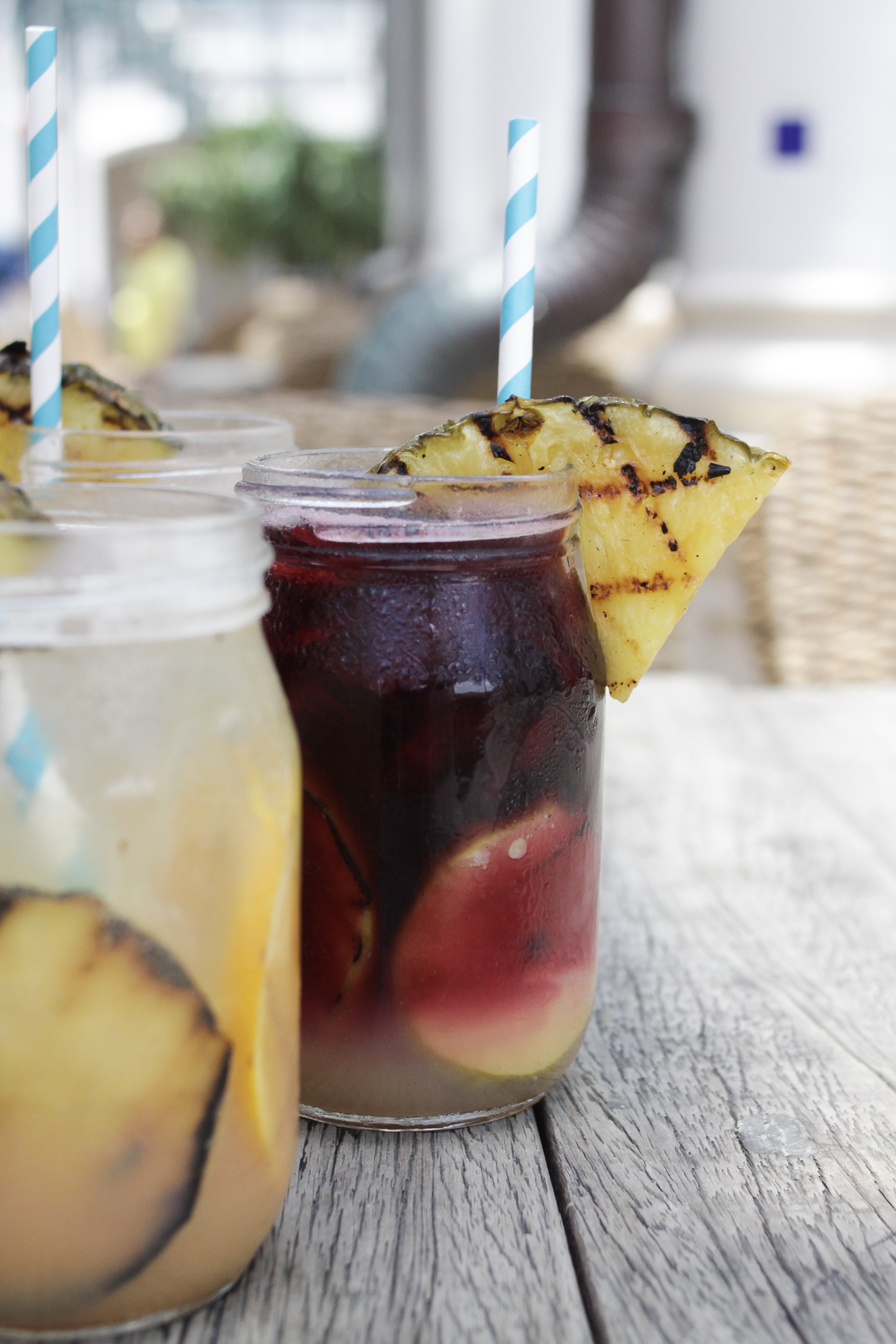 Fruit cocktails with paper straws 