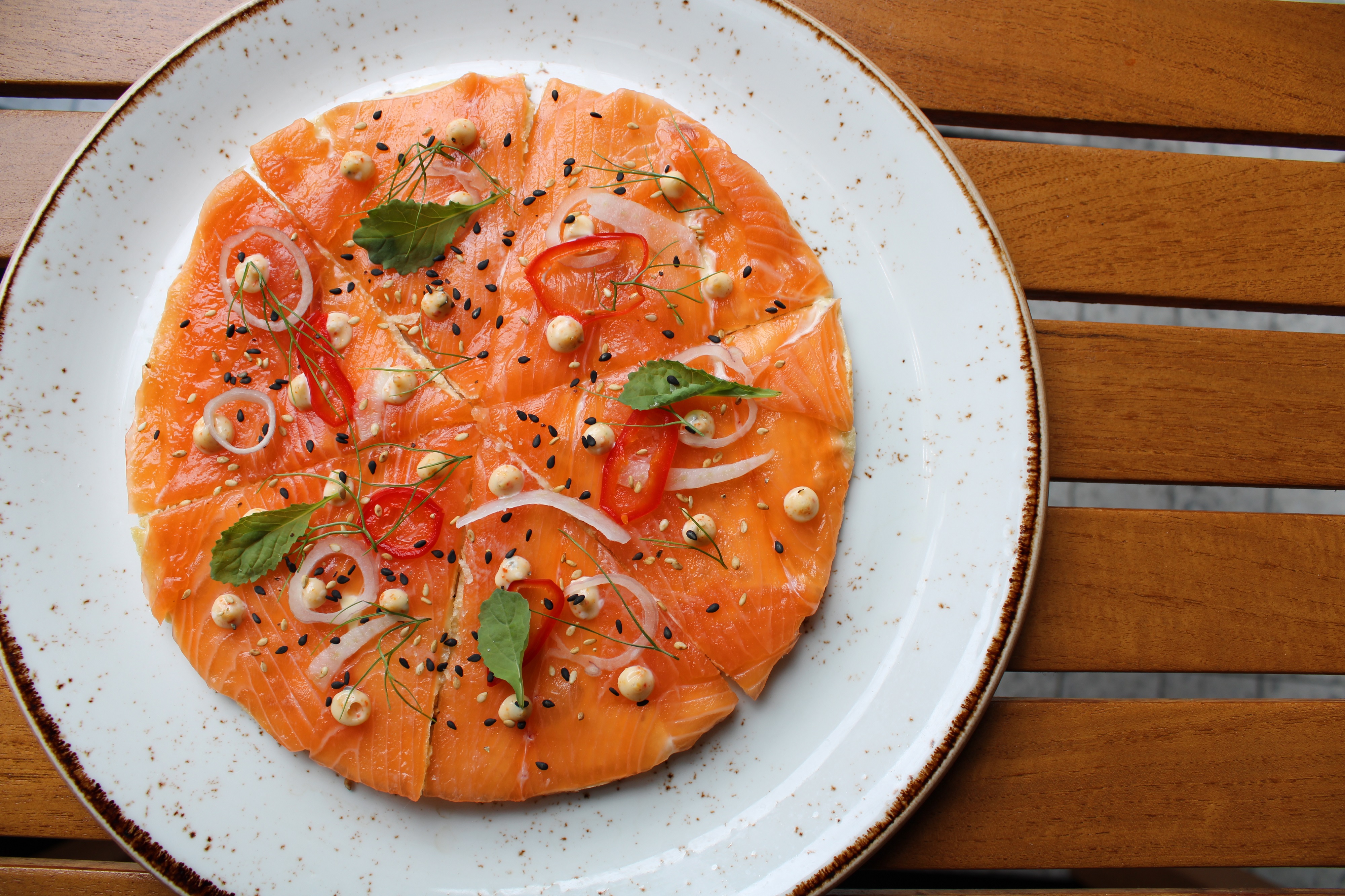 Unique pizza topped with salmon
