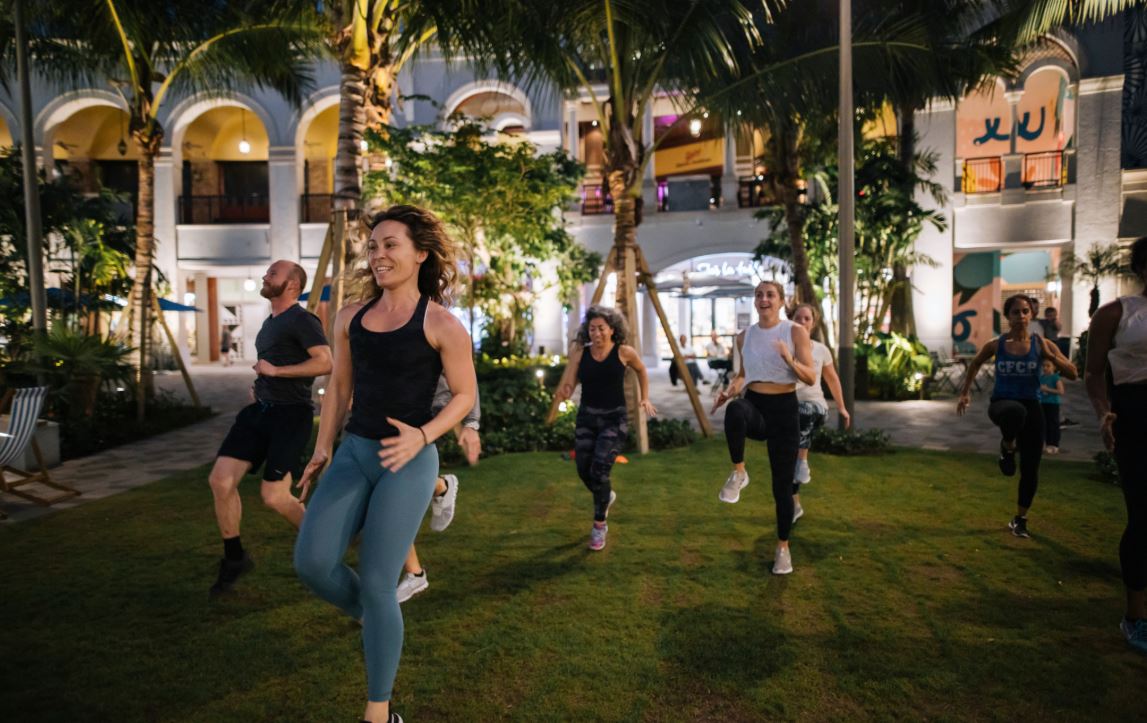 People working out on a lawn