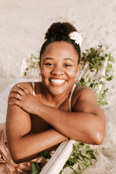 Women sitting and smiling