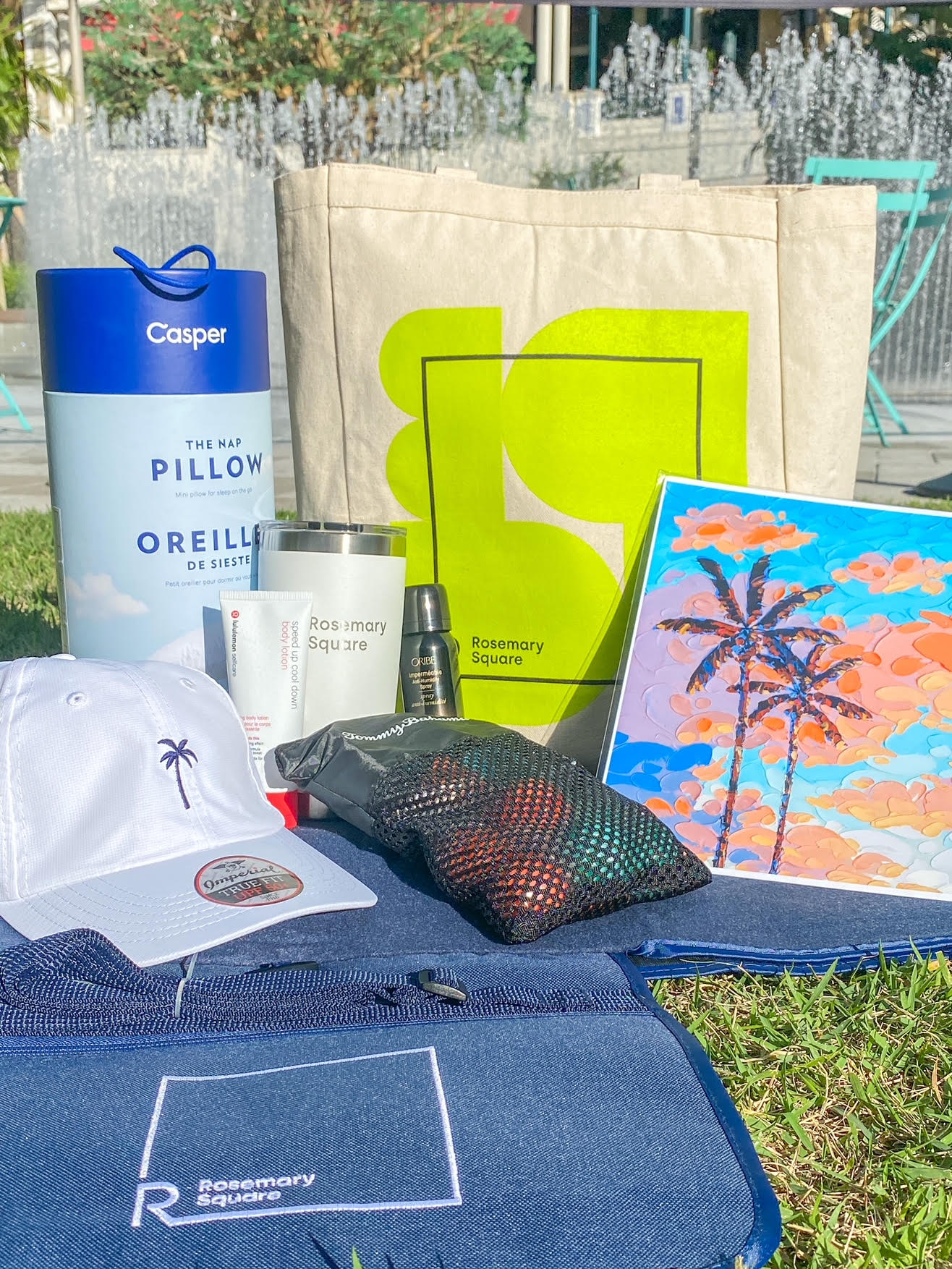 a variety of goodies on a picnic blanket