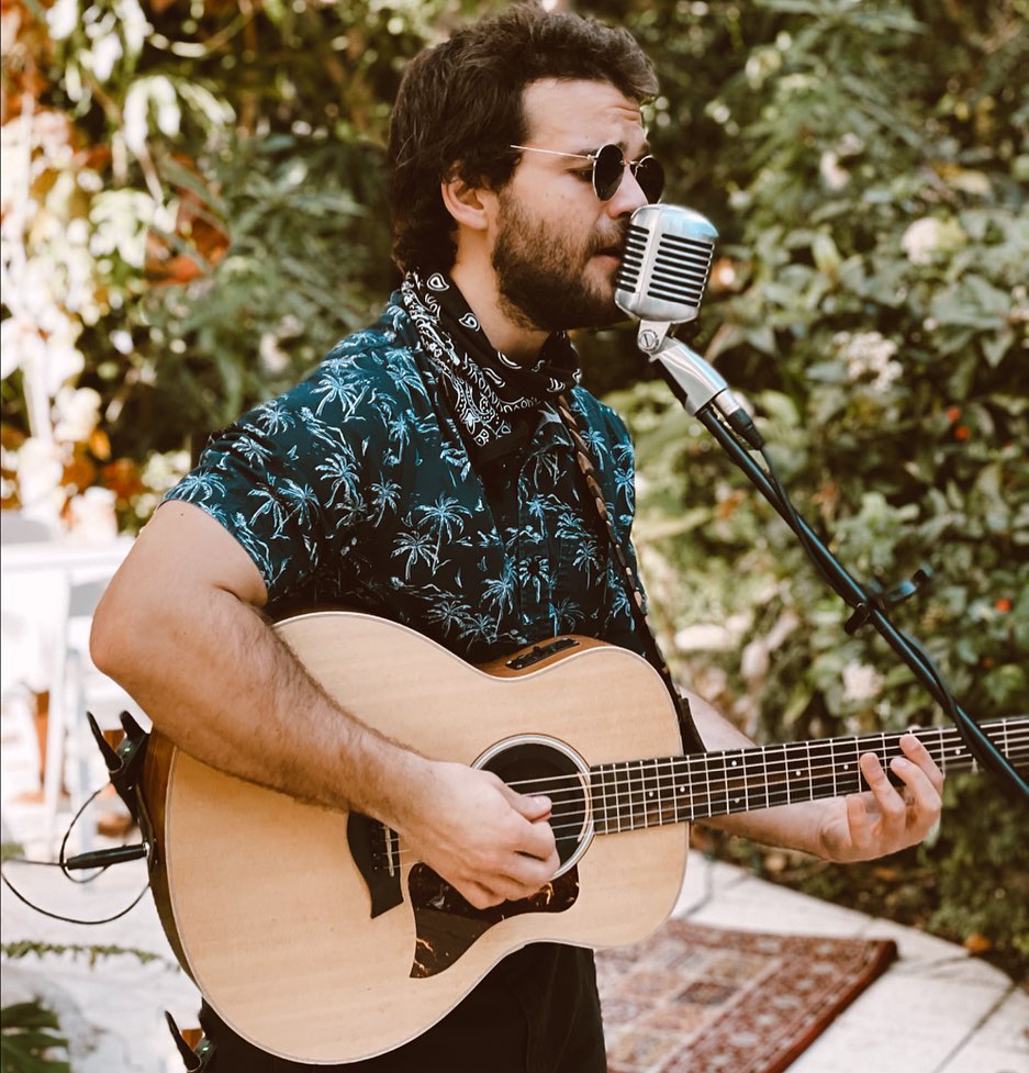 Man singing with guitar