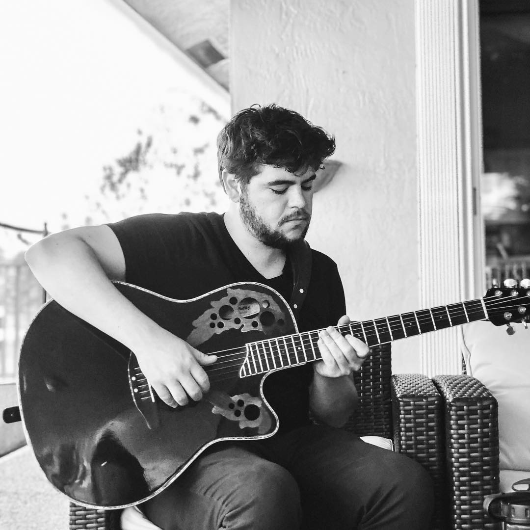 Young man playing guitar