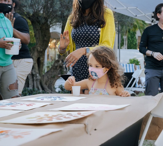 Little girl doing craft project