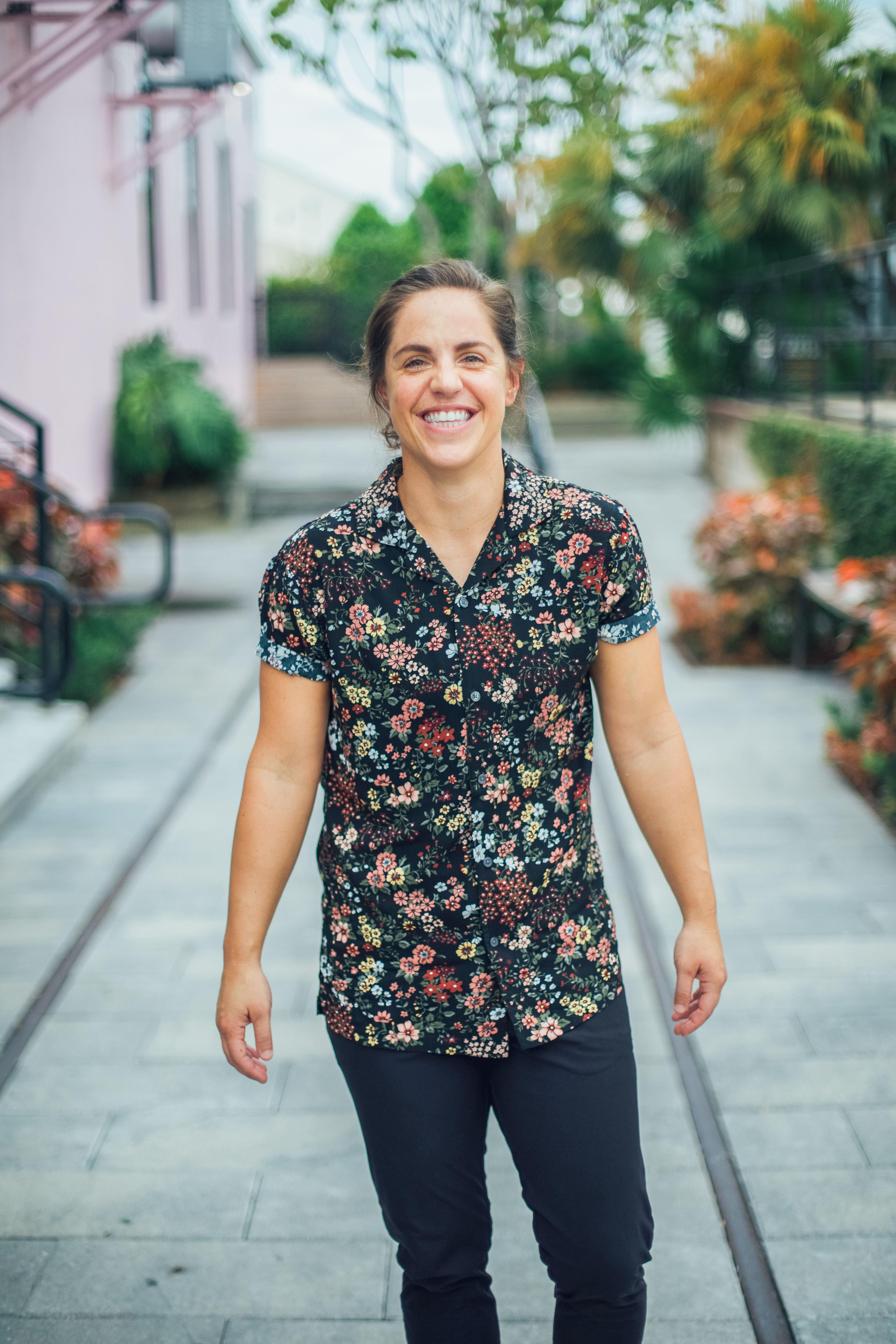 Woman standing and smiling 