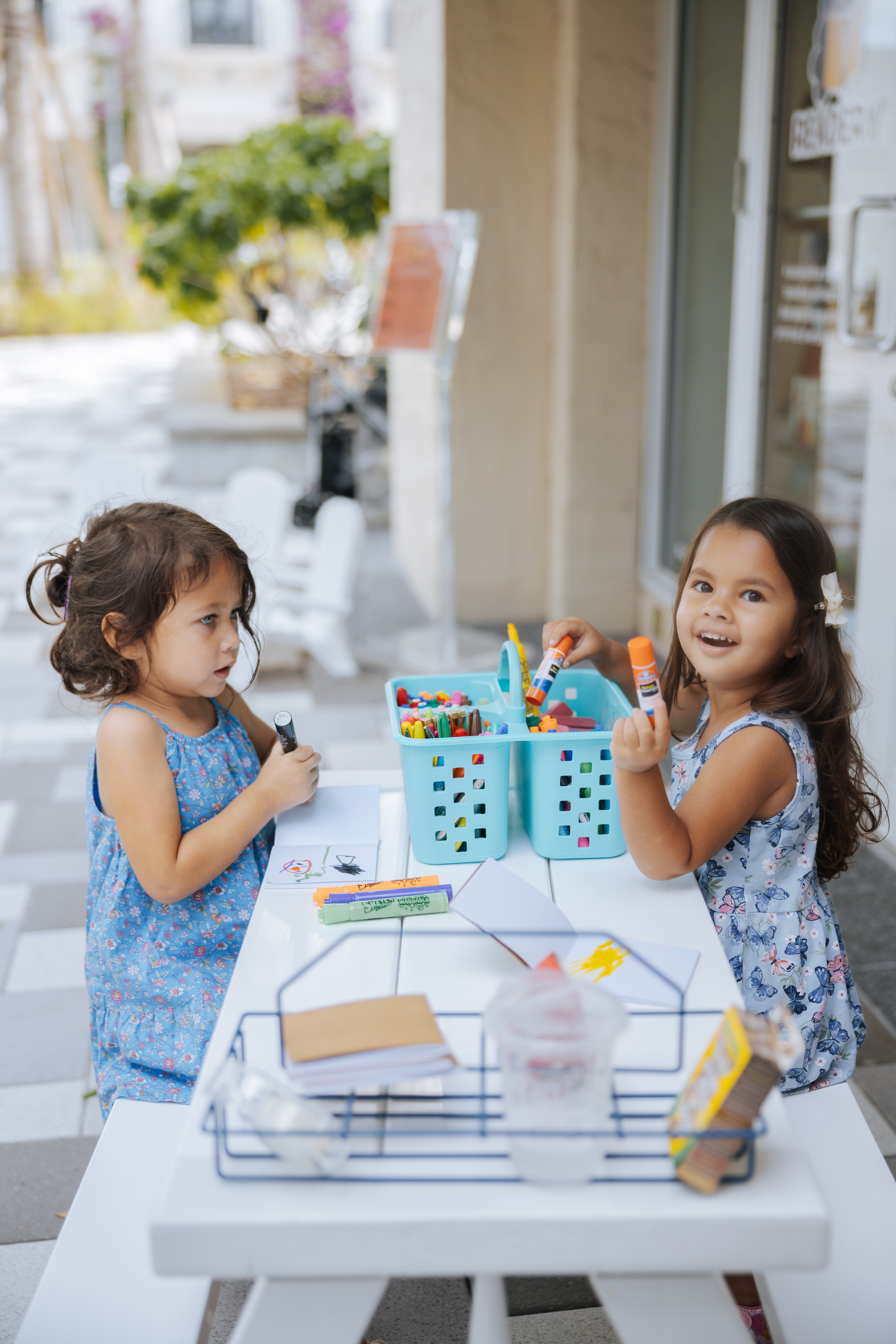 two young girls crafting
