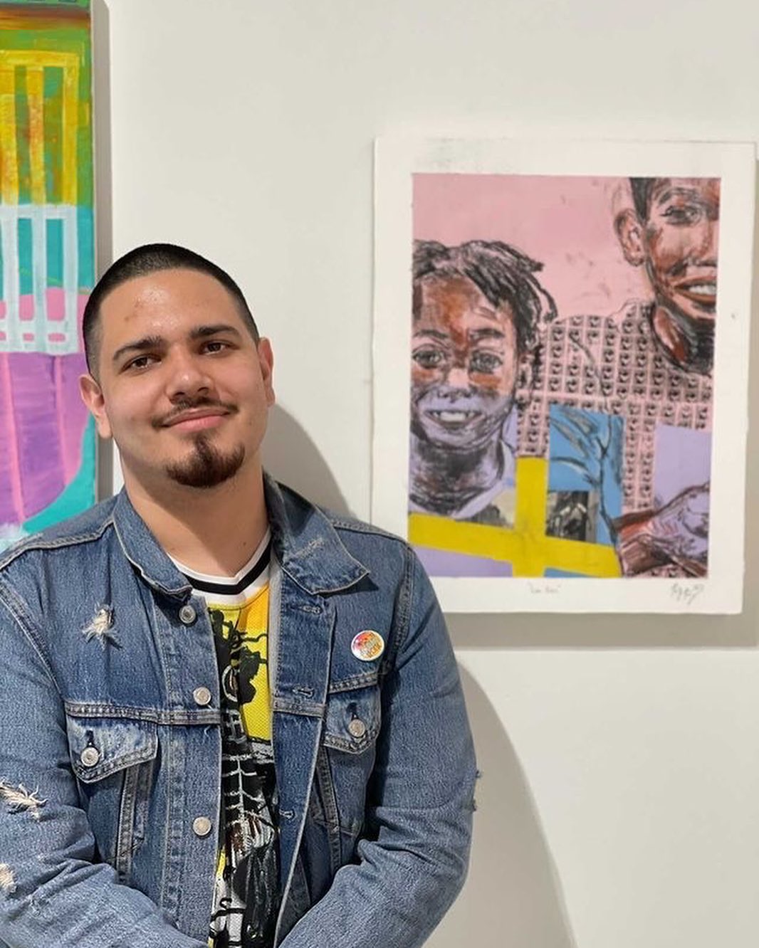 Man standing in front of painting