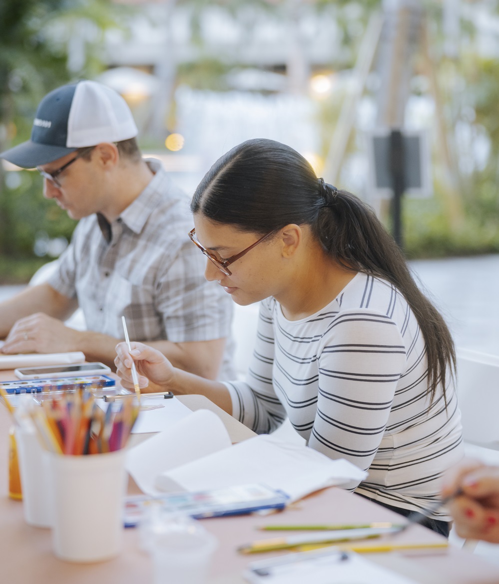 woman taking art class
