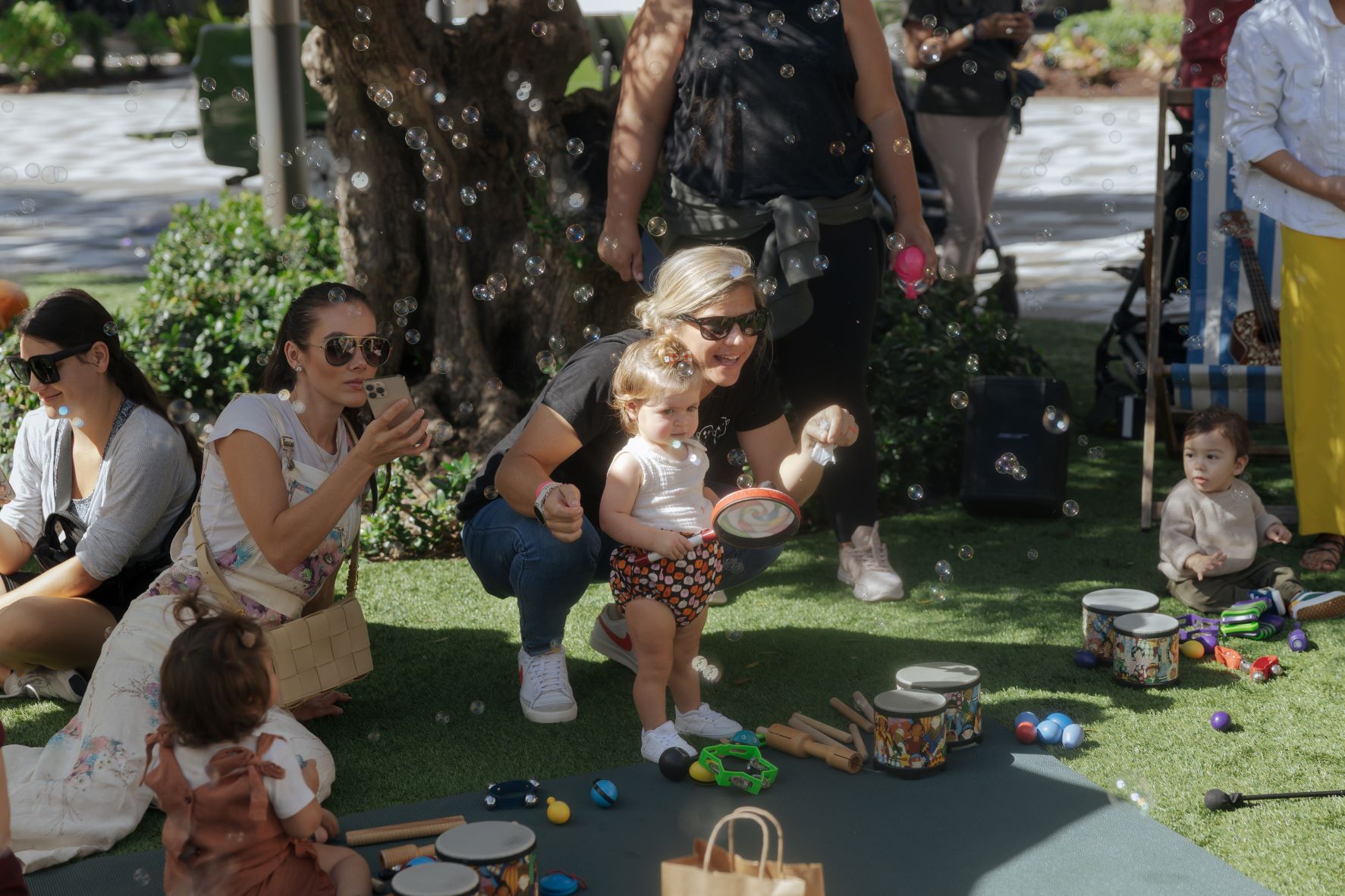Mom and child playing with bubbles