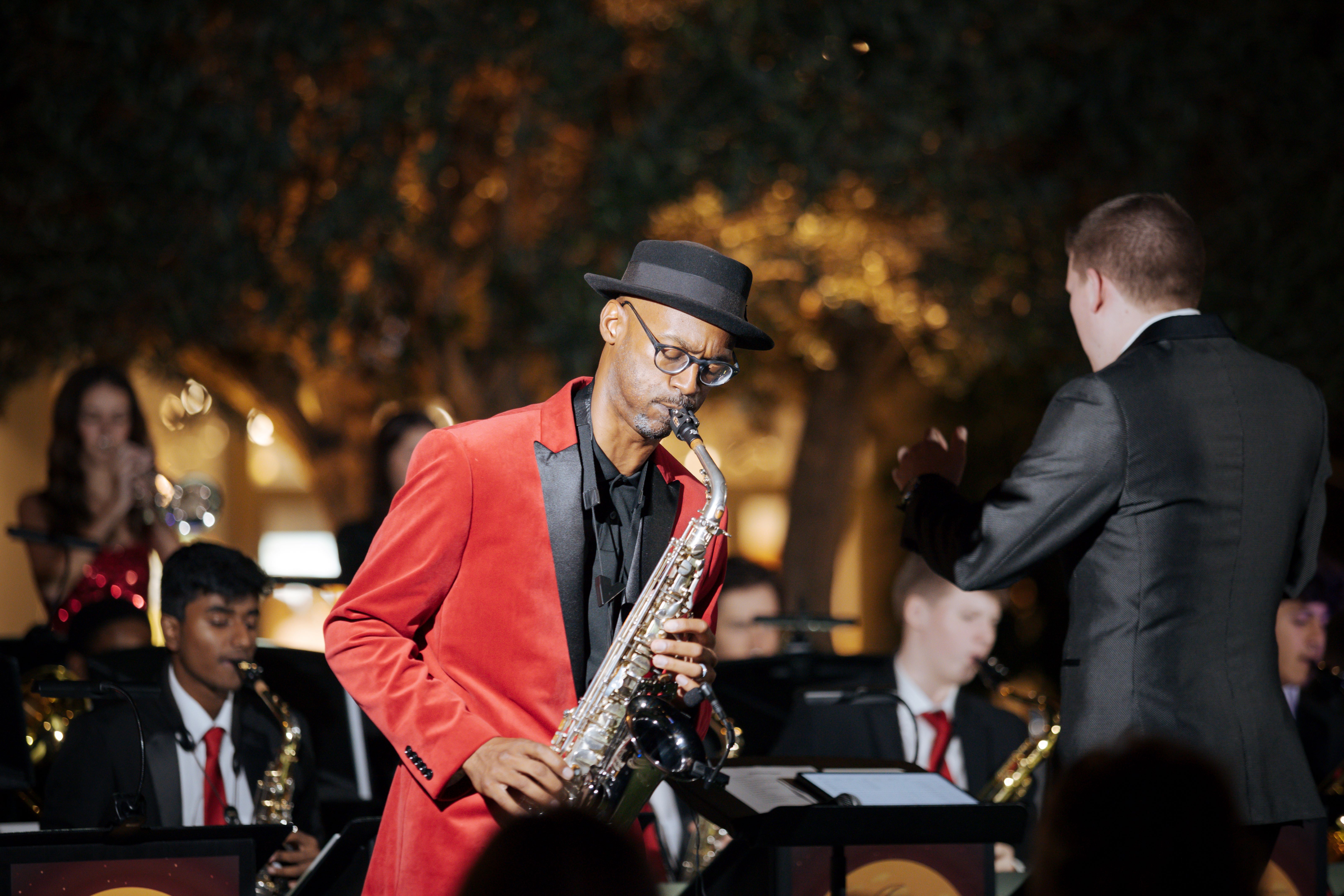 Man performing with a saxophone 