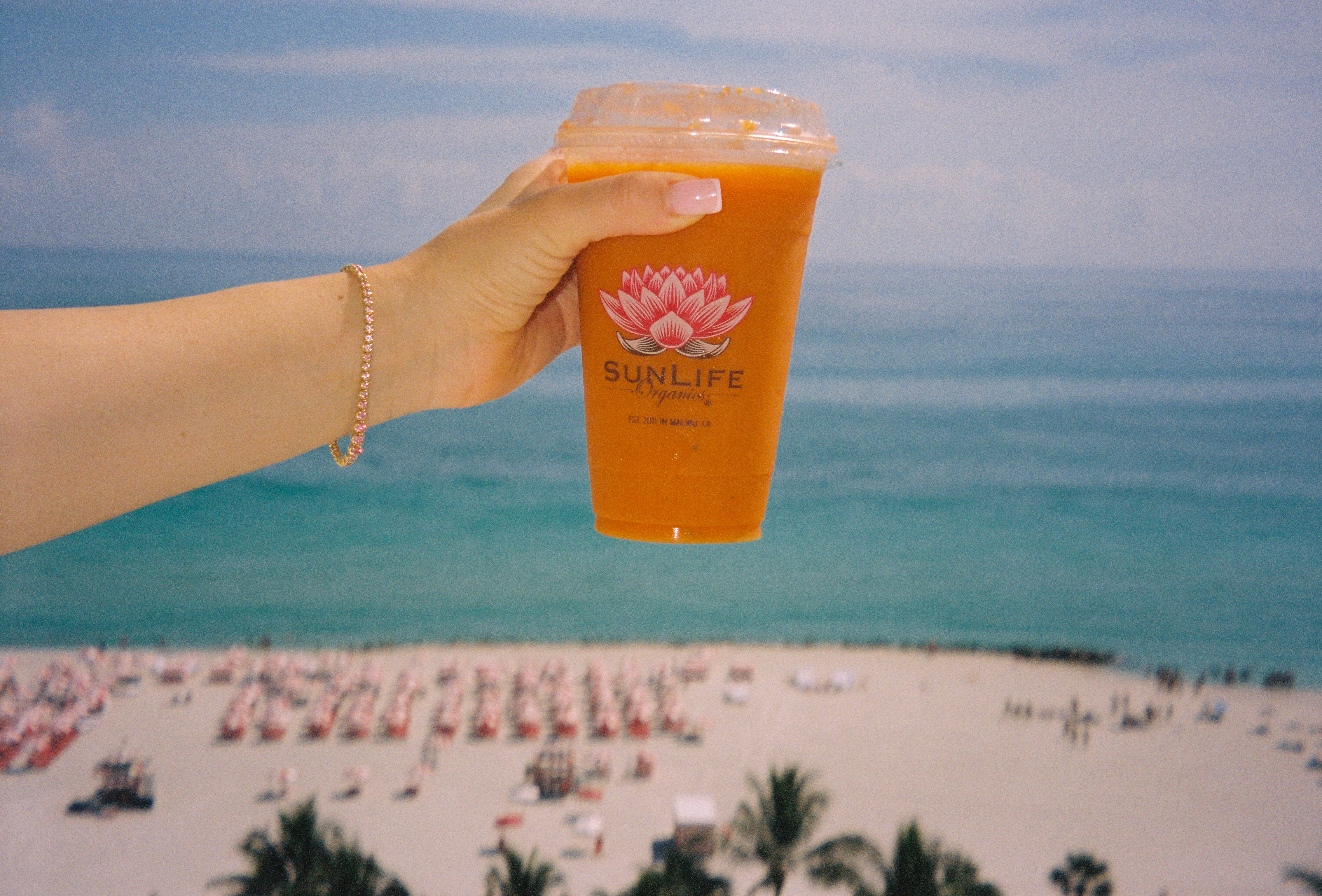 Girl holding a smoothie