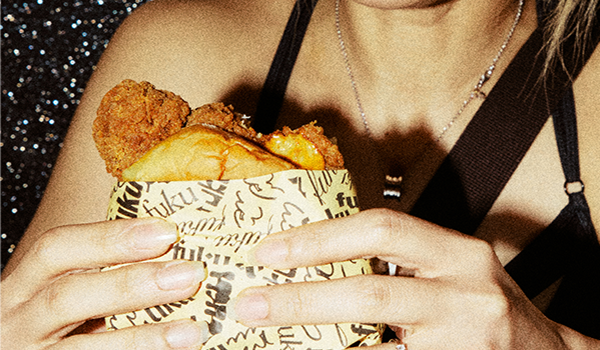 Fuku Sandwich in a girls hands