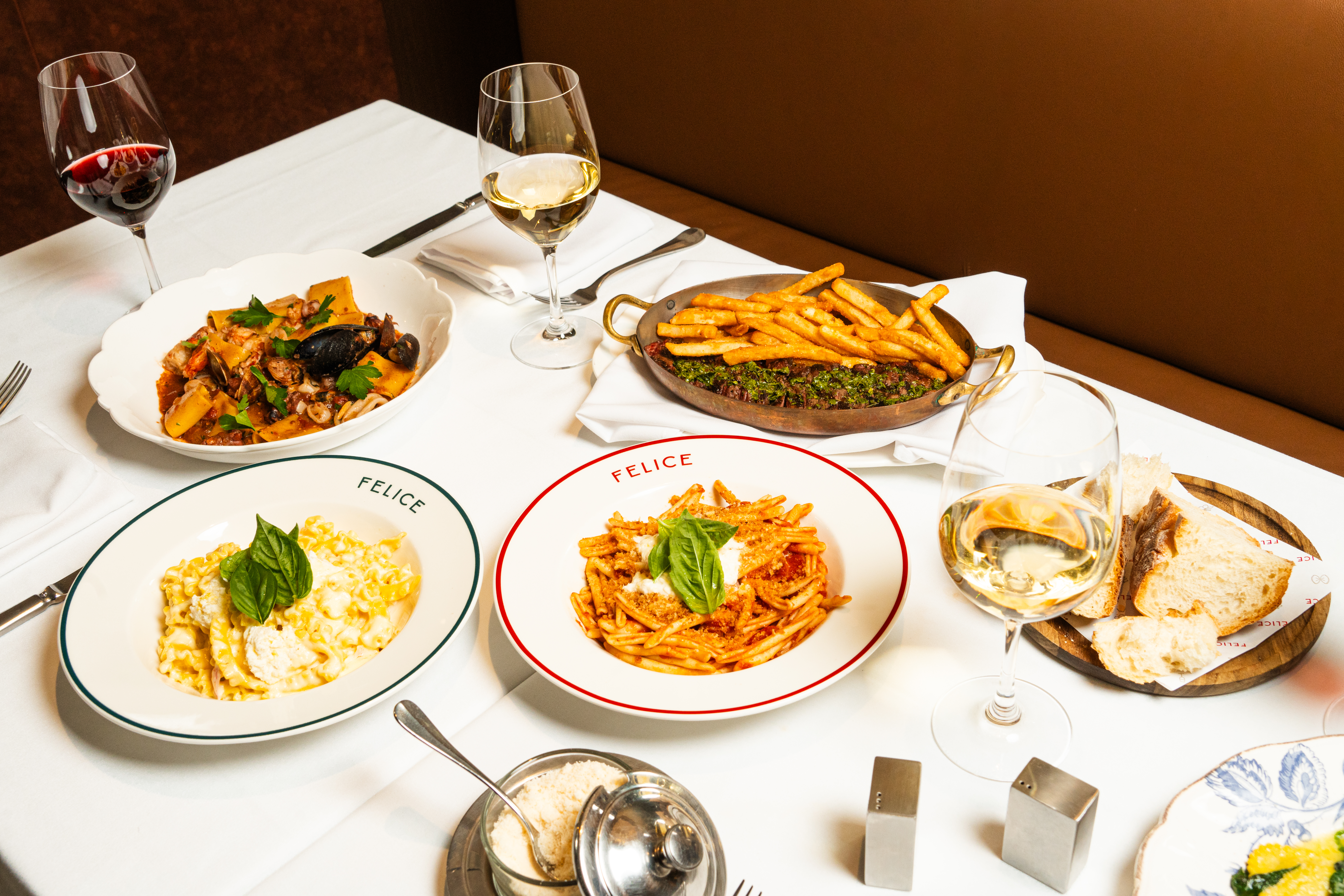 italian food at a dinner table at an upscale modern restaurant