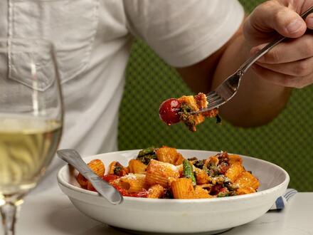 Bowl of pasta with a fork in it