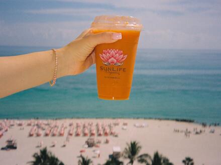 Girl holding a smoothie