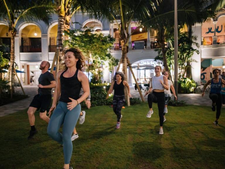 People working out on a lawn