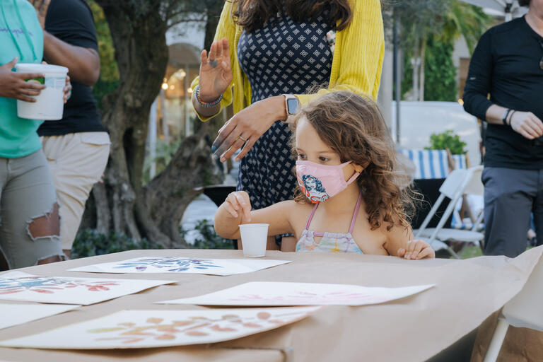 Little Girl doing a craft activity 