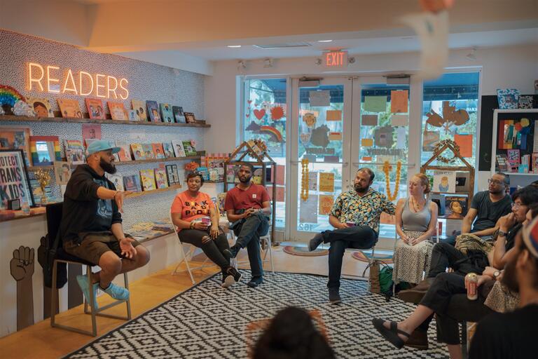 Individuals gather at Rohi's Readery