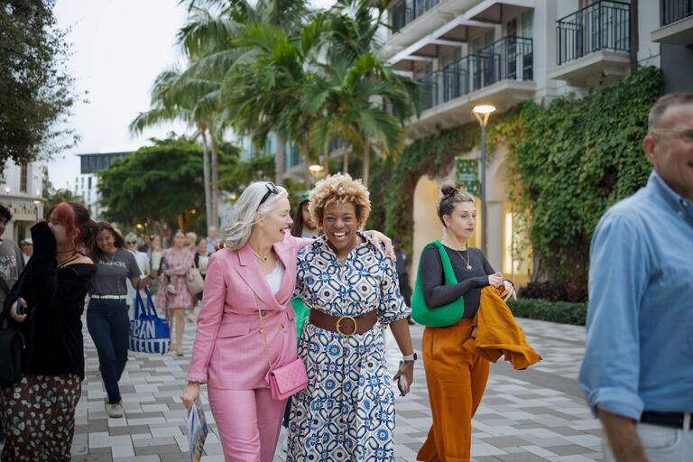 Two women walking down the street
