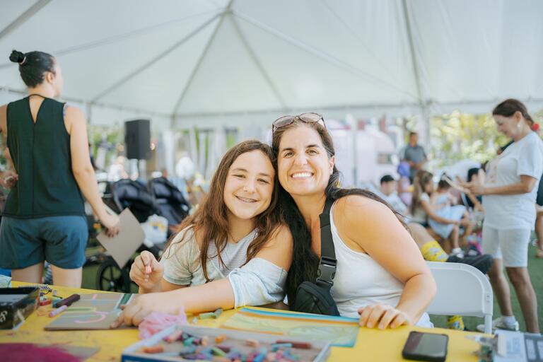 Mom and daughter doing a craft