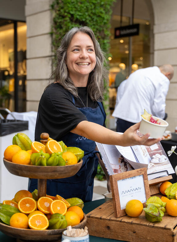 Woman handing out food