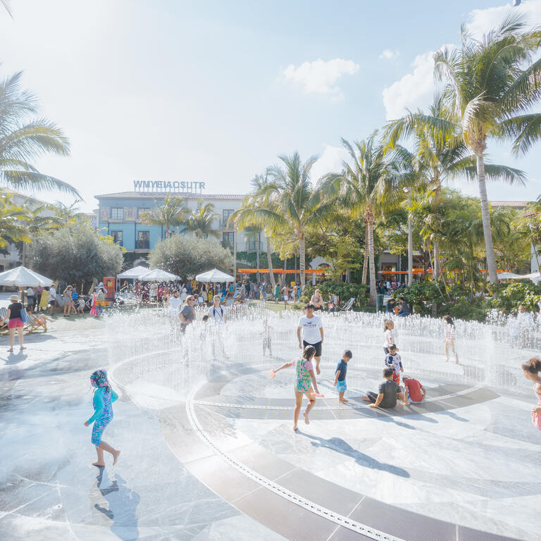 children playing in fourntain