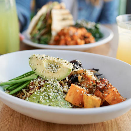 bowl of greens and sweet potato 