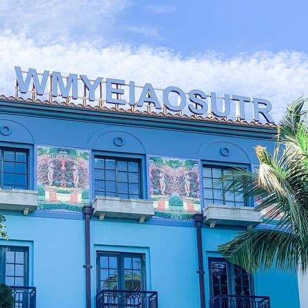 Art piece spelling out My East Is Your West