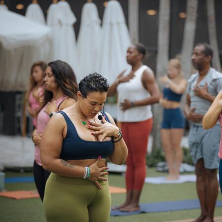 Jade Wonzo instructing Wednesday night yoga class